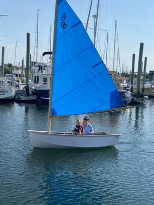 Abby & Kenzie age 4 sailing a Dyer Dhow at NEB