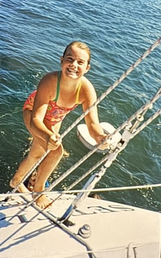 Abby around 8 years old on Peterson 42 Settler Transom