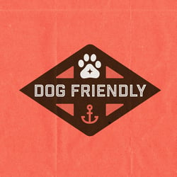 Orange and brown graphic featuring a paw print and an anchor with the words, 'DOG FRIENDLY' 